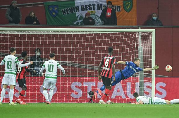 Leverkusen's Finnish goalkeeper Lukas Hradecky makes a save during the UEFA Europa League Group G football match Bayer 04 Leverkusen v Celtic in...