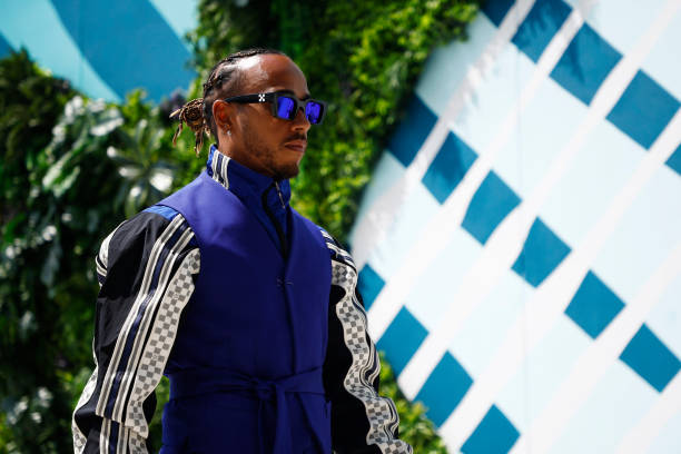 Lewis Hamilton of Great Britain and Mercedes walks in the Paddock during previews ahead of the F1 Grand Prix of Miami at the Miami International...