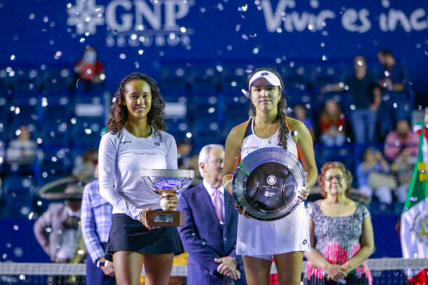Leylah Fernandez of Canada and Camila Osorio of Colombia pose with first and second place trophies after the singles final match as part of the GNP...