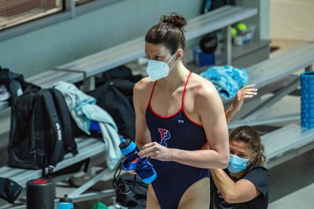 Lia Thomas, a transgender woman, walks to the pool to swim for the for the University of Pennsylvania at an Ivy League meet against Harvard...