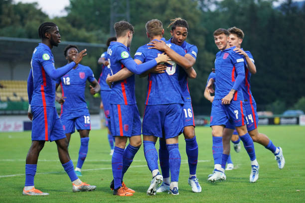 Liam Delap of England celebrates with teammates after scoring their team's first goal during the UEFA European Under-19 Championship 2022 Group B...