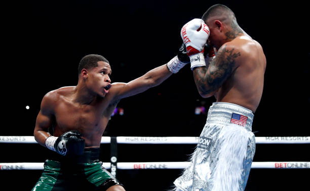 Lightweight champion Devin Haney punches Joseph Diaz Jr. During a title fight at MGM Grand Garden Arena on December 04, 2021 in Las Vegas, Nevada....