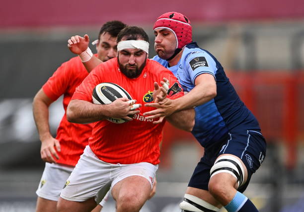 Limerick , Ireland - 28 May 2021; James Cronin of Munster is tackled by Cory Hill of Cardiff Blues during the Guinness PRO14 Rainbow Cup match between Munster and Cardiff Blues at Thomond Park in Limerick. (Photo By Piaras Ó Mídheach/Sportsfile via Getty Images)