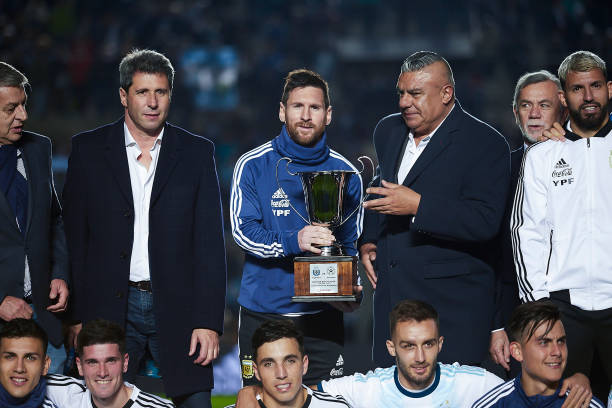 Lionel Andres Messi of Argentina holds the trophy after a friendly match between Argentina and Nicaragua at Estadio San Juan del Bicentenario on May...
