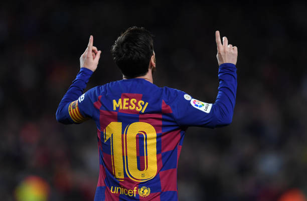 Lionel Messi of FC Barcelona celebrates after scoring his team's first goal during the La Liga match between FC Barcelona and Real Sociedad at Camp...