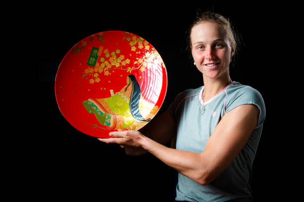 Liudmila Samsonova of Russia poses with the champions trophy after defeating Qinwen Zheng of China in the final match on Day 7 of the Toray Pan...
