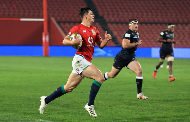 JOHANNESBURG, SOUTH AFRICA - JULY 07: Louis Rees-Zammit of The British and Irish Lions breaks away to score a try during the Cell C Sharks v British & Irish Lions tour match at Emirates Airline Park on July 07, 2021 in Johannesburg, South Africa. (Photo by David Rogers/Getty Images)