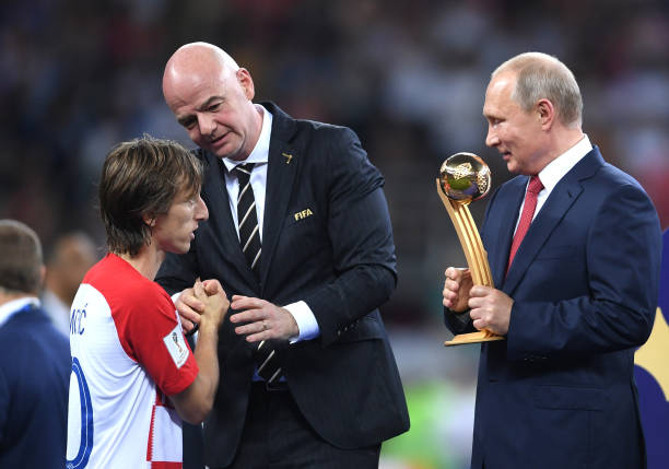 Luka Modric of Croatia receives the adidas Golden Ball award from President of Russia Vladimir Putin during the 2018 FIFA World Cup Final between...