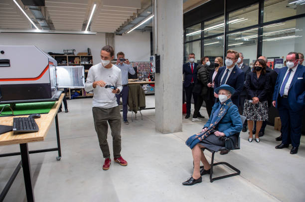 Lukas Wiesmeier, co-founder of Angsa-Robotics , shows Queen Margrethe II of Denmark a robot that can autonomously collect waste from green and gravel...