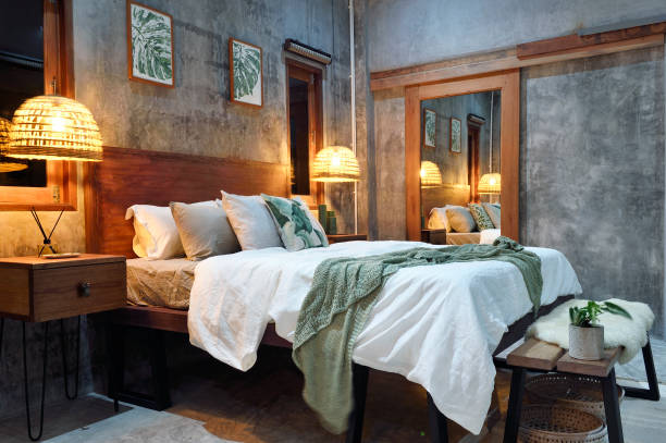 luxury concrete bedroom at night - quarto moderno  - fotografias e filmes do acervo