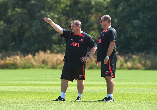 Manager Matt Beard and Paul McHugh of Liverpool FC Women during a training session at Solar Campus on August 3, 2022 in Wallasey, England.
