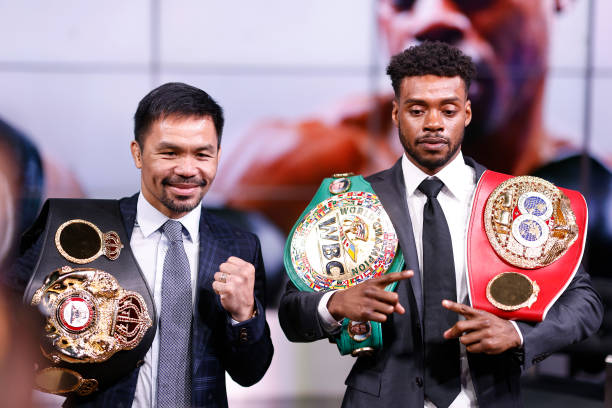 Manny Pacquiao and Errol Spence Jr pose for the media following their press conference at Fox Studios on July 11, 2021 in Los Angeles, California....