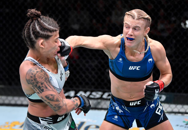 Manon Fiorot of France punches Mayra Bueno Silva of Brazil in a flyweight fight during the UFC Fight Night event at UFC APEX on October 16, 2021 in...