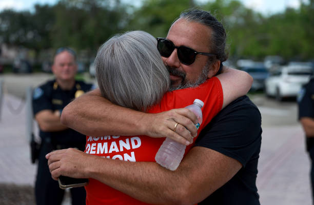 FL: South Florida Residents Gather To Remember Victims Of Buffalo And Uvalde Shootings