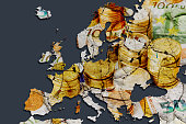 Map of Europe with lots of cracks as a symbol of contradictions and disagreements in the area of finance and investment. Stack of euro coins on euro banknotes.