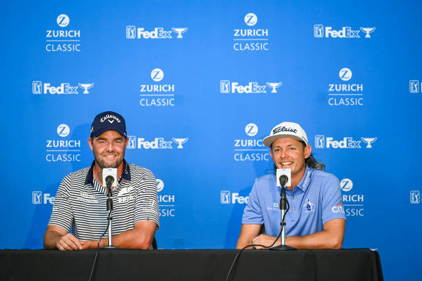 Marc Leishman of Australia and Cameron Smith of Australia smile at a press conference during practice for the Zurich Classic of New Orleans at TPC...