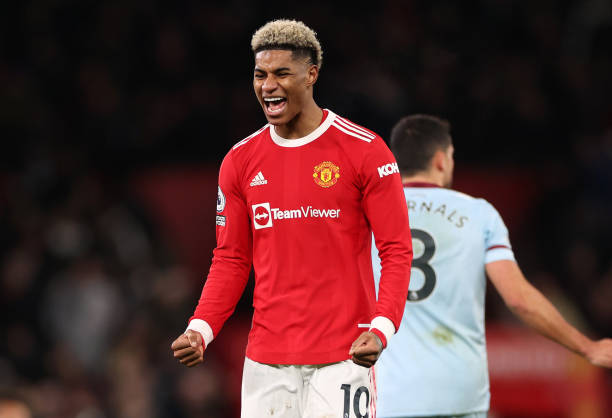 Marcus Rashford of Manchester United celebrates at the full time whistle during the Premier League match between Manchester United and West Ham...
