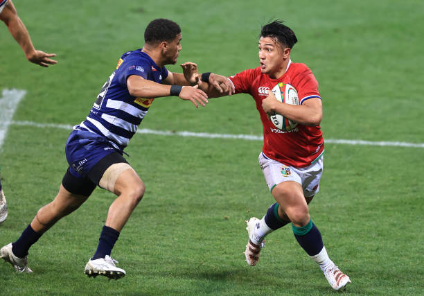 CAPE TOWN, SOUTH AFRICA - JULY 17: Marcus Smith of the British & Irish Lions is tackled by Abner van Reenen of DHL Stormers during the match between DHL Stormers and British & Irish Lions at Cape Town Stadium on July 17, 2021 in Cape Town, South Africa. (Photo by David Rogers/Getty Images)