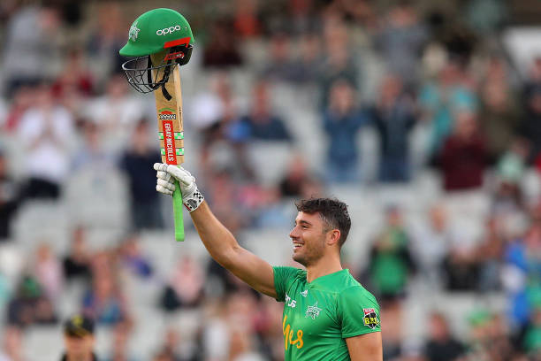 Marcus Stoinis of the Stars celebrates reaching 100 runs during the Big Bash League match between the Melbourne Stars and the Sydney Sixers at the...