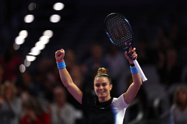 Maria Sakkari of Greece celebrates after defeating Aryna Sabalenka of Belarus in their Women's Singles Group Stage match during the 2022 WTA Finals,...