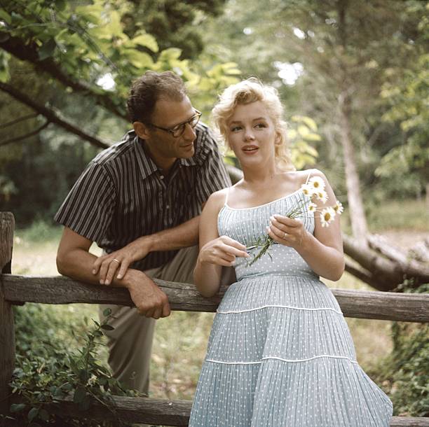 Marilyn Monroe with her husband, playwright Arthur Miller in 1957 in Amagansett, New York.