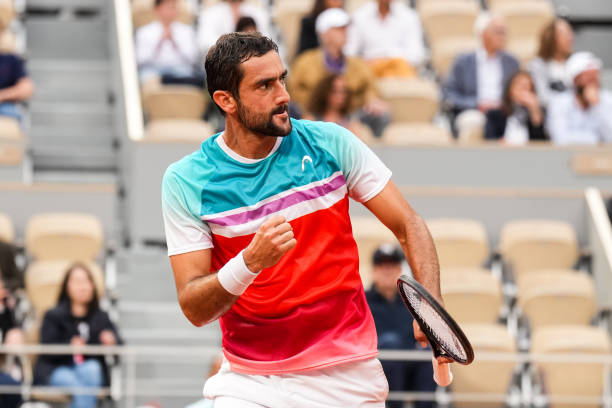 Marin Cilic of Croatia reacts in the Men's Singles Semi Final match against Casper Ruud of Norway during Day Thirteen of The 2022 French Open at...
