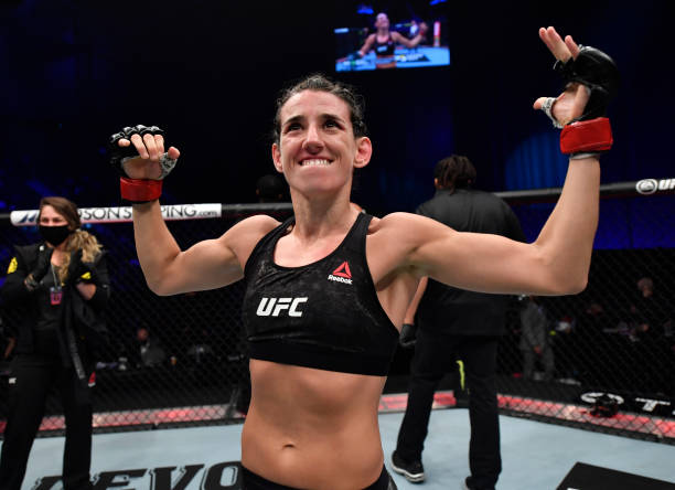 Marina Rodriguez of Brazil reacts after her knockout victory over Amanda Ribas of Brazil in a strawweight fight during the UFC 257 event inside...