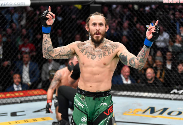 Marlon Vera of Ecuador reacts after his knockout victory over Frankie Edgar in their bantamweight fight during the UFC 268 event at Madison Square...
