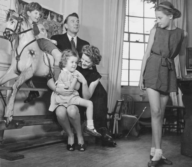 Married British actors Michael Redgrave and Rachel Kempson with their children Corin, Lynn and Vanessa, 31st October 1946.