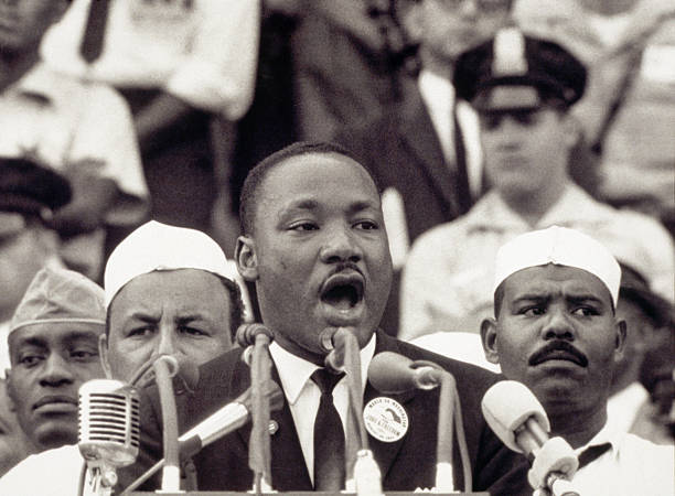 Martin Luther King Jr., gives his "I Have a Dream" speech to a crowd before the Lincoln Memorial during the Freedom March in Washington, DC, on...