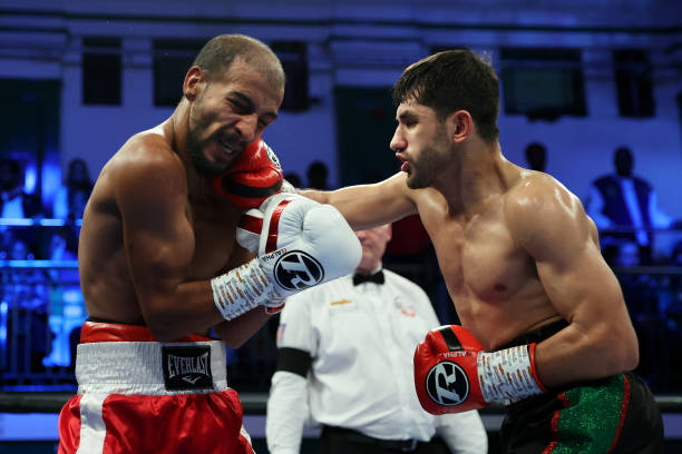 Masood Abdulah punches Stefan Nicolae during their fight at York Hall on September 16, 2022 in London, England.