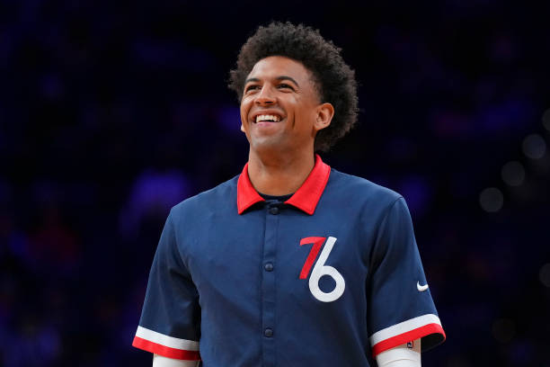 Matisse Thybulle of the Philadelphia 76ers smiles prior to the game against the Detroit Pistons at the Wells Fargo Center on April 10, 2022 in...