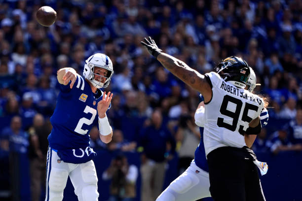 Matt Ryan of the Indianapolis Colts passes against the Jacksonville Jaguars during the second quarter at Lucas Oil Stadium on October 16, 2022 in...