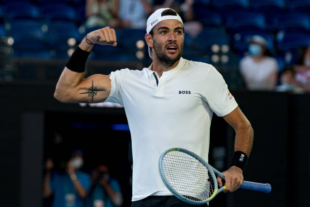 Matteo Berrettini of Italy celebrates winning match point in his third round singles match against Carlos Alcaraz of Spain during day five of the...