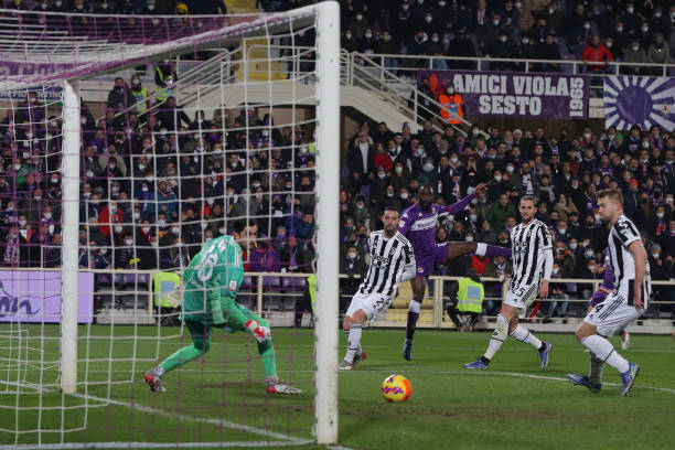 Mattia Perin, Matthijs De Ligt, Adrien Rabiot and Mattia De Sciglio of Juventus look on as Jonathan Ikone of ACF Fiorentina shoots on target during...