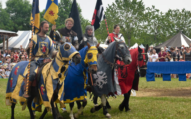 Medieval jousting event of knights on horses in German traditional festival of Hallbergmoos, Munich, Germany