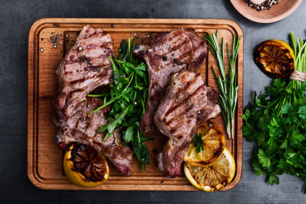 mediterranean style grilled veal chops with fresh arugula salad picture