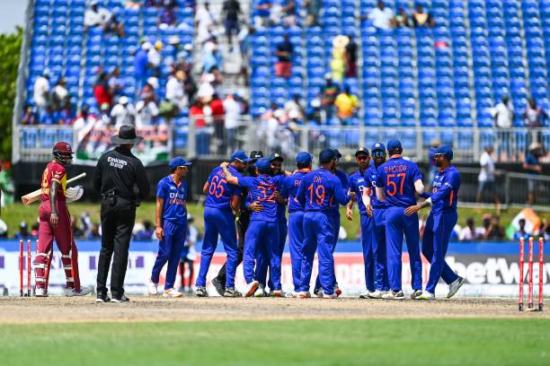 Members of the India team celebrate after winning the fourth T20I match between West Indies and India at the Central Broward Regional Park in...