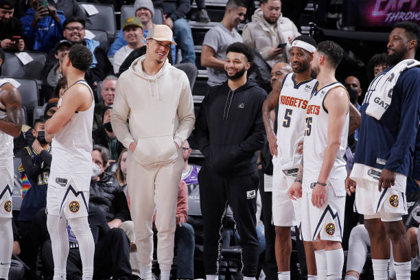 Michael Porter Jr. #1 and Jamal Murray of the Denver Nuggets look on during the game against the Sacramento Kings on February 24, 2022 at Golden 1...