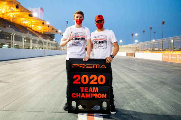 Mick Schumacher of Germany and Prema Racing and Robert Shwartzman of Russia and Prema Racing pose for a photo as they celebrate winning the F2 2020...