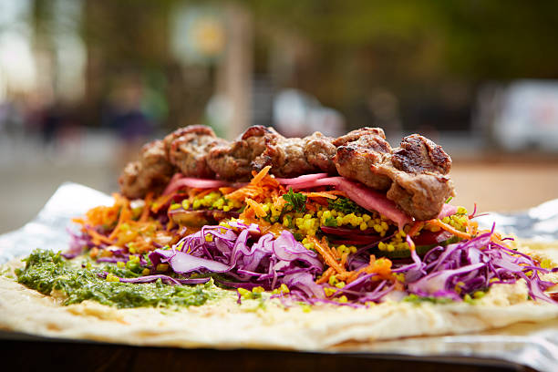 middle eastern lamb kebab wrap on food truck picture