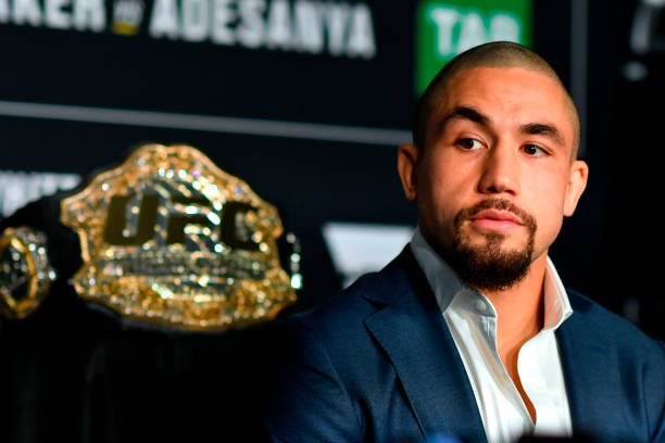 Middleweight champion Robert Whittaker of New Zealand interacts with media during UFC 243 Ultimate Media Day at Marvel Stadium on October 4, 2019 in...
