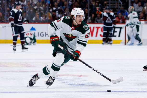 Minnesota Wild center Adam Beckman skates with the puck during the NHL hockey game against the Colorado Avalanche on Saturday, Oct. 30, 2021 at Ball...