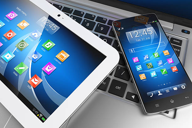 Mobile devices. Tablet PC, smartphone on laptop, technology concept