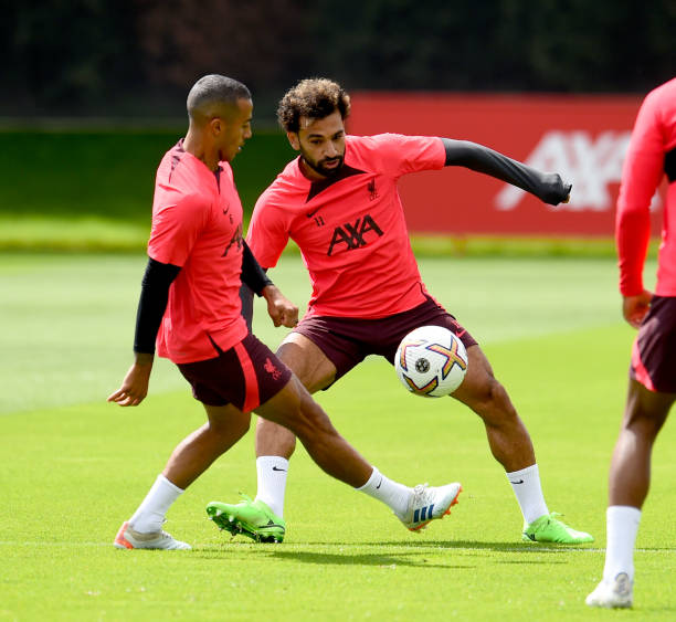 Mohamed Salah and Thiago Alcantara of Liverpool during a training session at AXA Training Centre on August 04, 2022 in Kirkby, England.