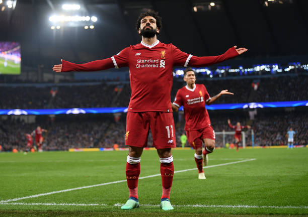 Mohamed Salah of Liverpool celebrates after scoring his sides first goal during the UEFA Champions League Quarter Final Second Leg match between...