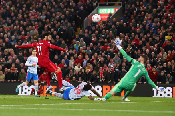 Mohamed Salah of Liverpool scores his side's fourth goal during the Premier League match between Liverpool and Manchester United at Anfield on April...