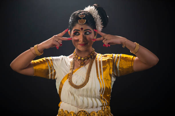 mohiniattam dancer denoting beautiful eyes through her dance performance - mohiniattam stock pictures, royalty-free photos & images