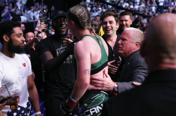 Molly McCann of England celebrates defeating Hannah Goldy of USA in the Flyweight bout with Stormzy during UFC Fight Night at O2 Arena on July 23,...