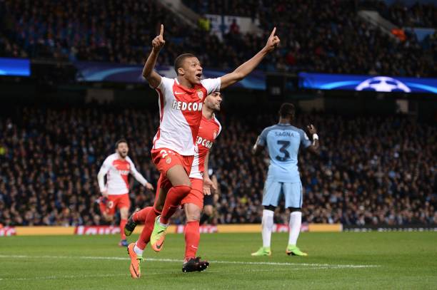 monacos-french-forward-kylian-mbappe-lottin-celebrates-scoring-their-picture-id643501628